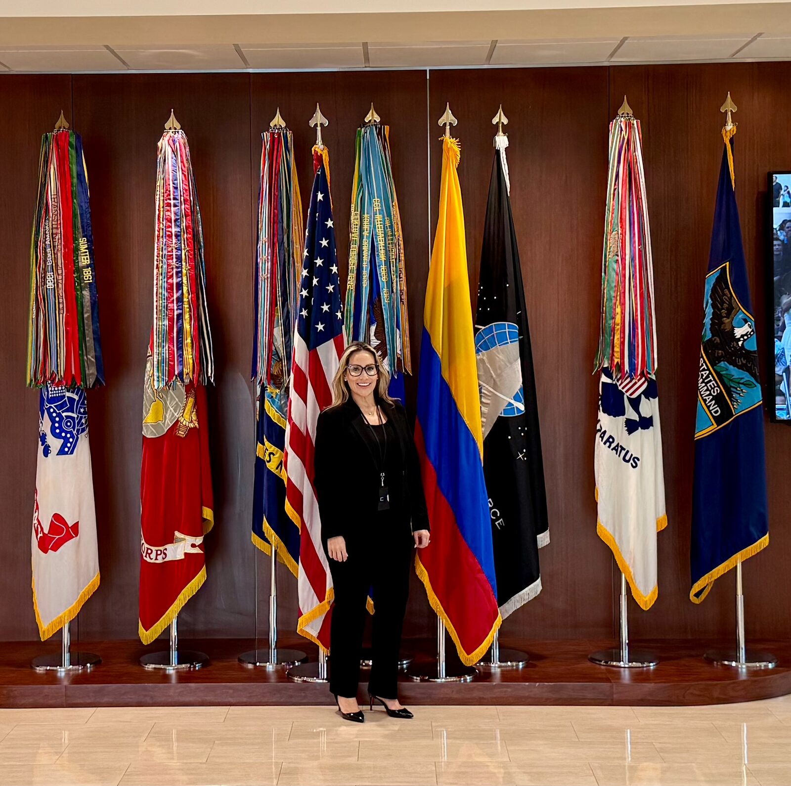 Jovianna Gonzalez at U.S. Southern Command, with the U.S., Colombian, and USSOUTHCOM colors